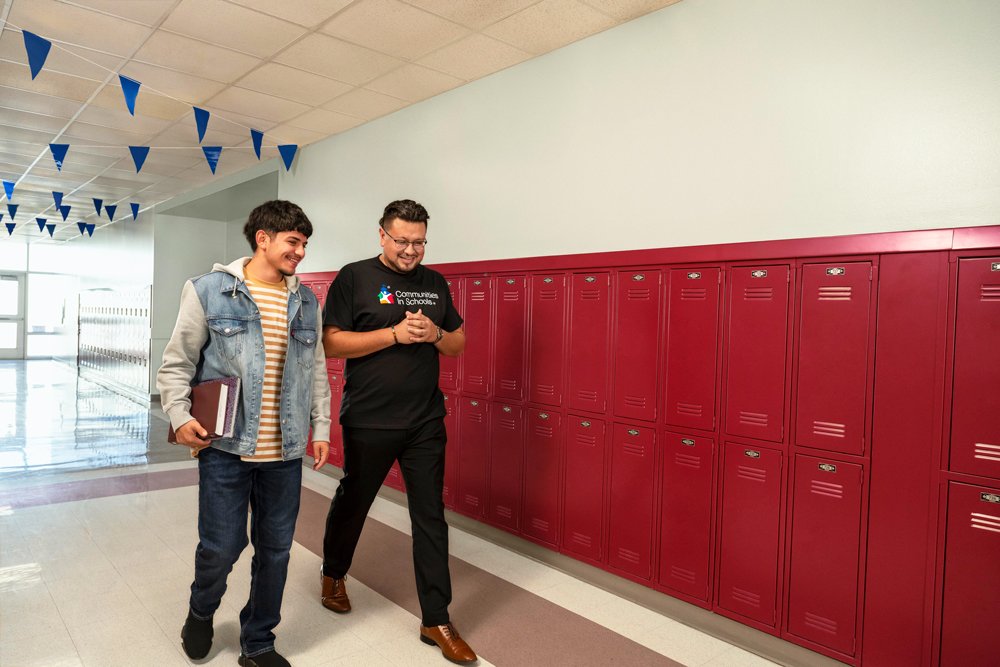 CIS Site Coordinator Marco and Alumnus Esteban